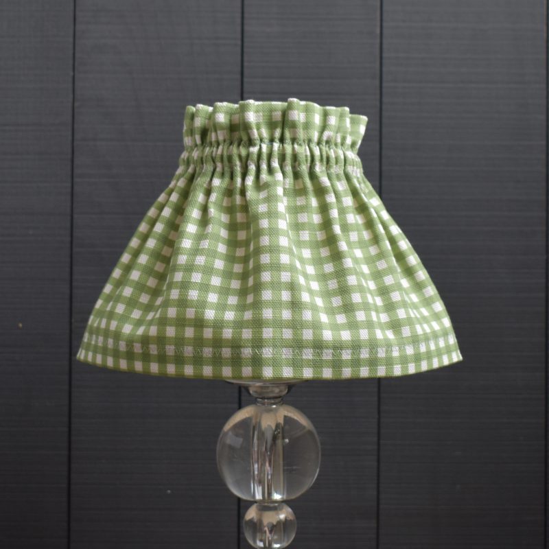 This is Dolly our Dolly Green Gingham Scrunchie Lampshade This a two piece set, the cover and the lampshade. underneath The cover slips on top easily, gathers beautifully and can be removed for hand washing. It is slightly bigger than the lampshade underneath. It is designed to be prouder at the top and longer at the base. Dimensions are shown in CM as Base Diameter x Top Diameter x Height
