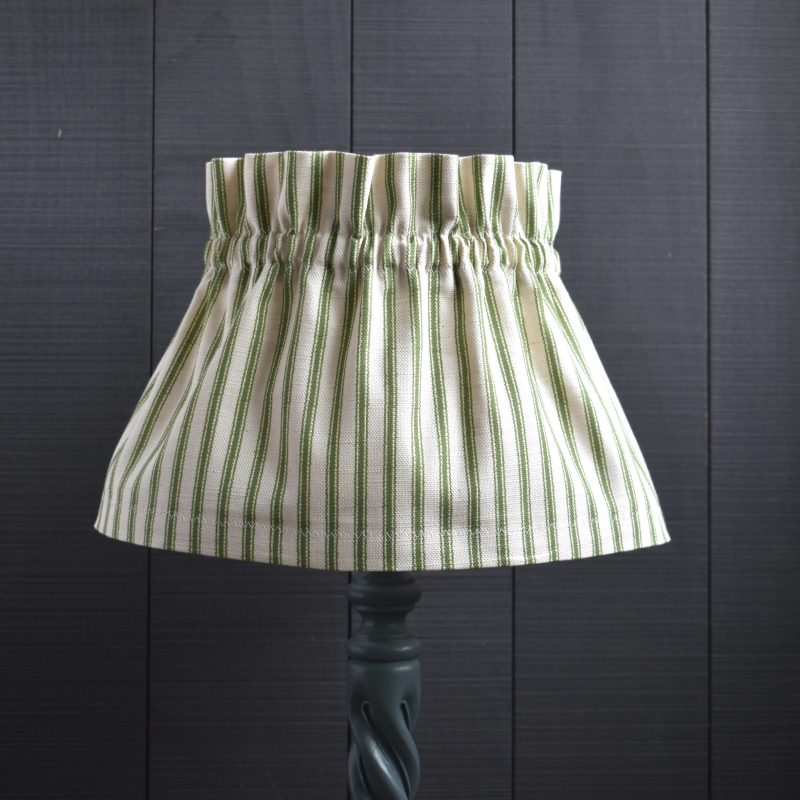Dolly Green Ticking Stripe Scrunchie Lampshade. This a two piece set, the cover and the linen lampshade underneath. The cover slips on top easily, gathers beautifully and can be removed for hand washing.