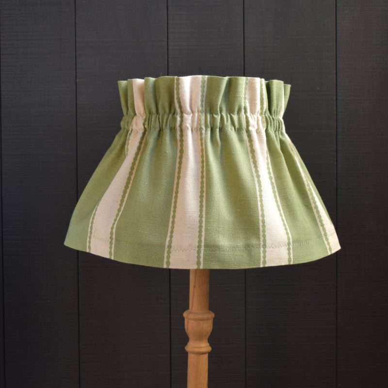 Dolly Green Stitch Stripe Scrunchie Lampshade. This a two piece set, the cover and the under lampshade. The cover slips on top easily, gathers beautifully and can be removed for hand washing.